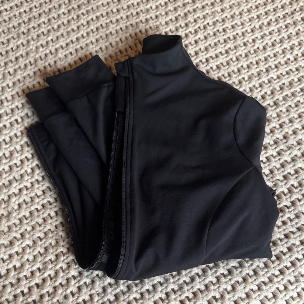 Black Sleeveless Zip-Up Top